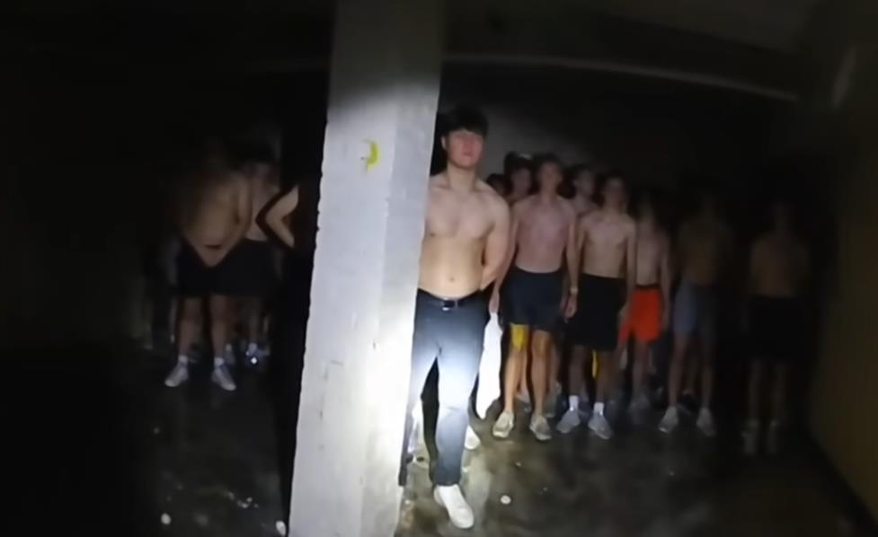 Police burst into the basement due to a fire report, found 56 young men there half-naked