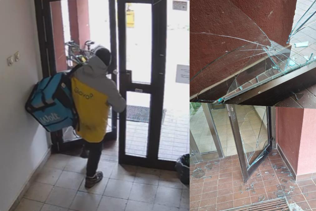 DOSTAVLJAČ DIVLJAK RAZBIJA VRATA! Čemu ovo? Otvara vrata zgrade na Dorćolu, a onda ih šutira i lomi staklo - POGLEDAJTE njegov huliganski potez (VIDEO)