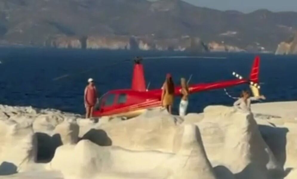 SLETEO HELIKOPTEROM USRED POZNATE PLAŽE, PA IZAŠAO DA SE BUĆNE: Kupači u šoku gledali šta radi, meštani BESNI! (VIDEO)