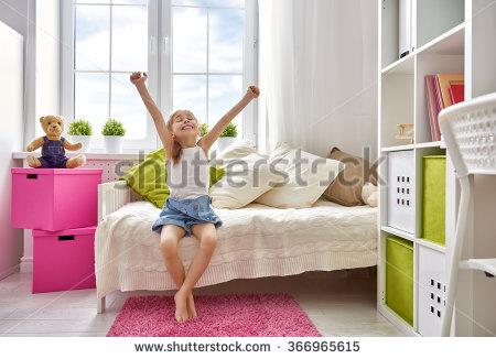 stockphotoanicechildgirlenjoyssunnymorninggoodmorningathomechildgirlwakesupfromsleep366965615.jpg