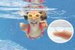 stockphotohappysmilingunderwaterkidinswimmingpoolactivegirlswimsandhavingfunchildsporton84164809.jpg