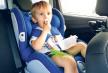 stockphotoimageofadorabletoddlerboysittinginchildcarsafetyseatandeatingcookies1400156282.jpg