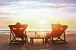 stockphotohappycoupleenjoyluxurysunsetonthebeachduringsummervacations265026164.jpg