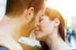 stockphotocloseupshotofyoungcouplekissingoutdoorcloseupoflovingcoupleembracingandkissing358201958.jpg