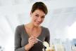 stockphotowomaninkitchenpreparingcreampuffs176500130.jpg