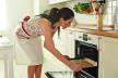 stockphotowomaninkitchenduringcookingbiscuits361924151.jpg