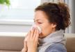 stockphotosickwomanfluwomancaughtcoldsneezingintotissueheadachevirus119173351.jpg