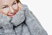 stockphotosmilinggirlinawarmsweater19350424.jpg