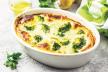 stockphotobroccolieggcheesecasseroleinbakingdishonconcretebackgroundselectivefocusspacefor1076840888.jpg