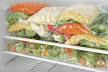 stockphotoplasticbagswithdifferentfrozenvegetablesinrefrigerator1603042342.jpg