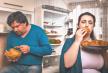 stockphotooverweightfamilyovereatingunhealthyfoodinkitchenmanandwomanstandingnearopenfrig1708795633.jpg