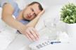 0809-stockphotohealthcareandillnessconceptsickmanwithfevertakingpillsorglassofwaterfrombedside1789759568.jpg