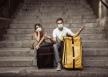 0618-stockphotocovidimpactininternationaltourismsadtouristcoupleworriedaboutcoronavirusquarantine1807626025.jpg