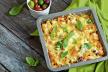 stockphotoovenbakedpastawithcolourfulolivepeppersandtomatoespastaandvegetablesgratininbaking713311063.jpg