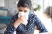 stockphotoillupsetindiangirlholdingpapertissueblowingrunningnosesneezinginhandkerchiefgotflu1606121233.jpg