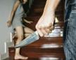 1503-stockphotocriminalwithknifeattackwomaninahousefocushand316040828.jpg