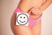 glavna-stockphotocloseupofwomanwithslenderfigureholdingnearbellycardwithsmilesmiling1765552343.jpg