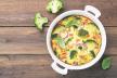 stockphotoovencookedredpaprikastuffedwithcheesegarlicandherbsonawhiteplatewithparcleyand617768738.jpg