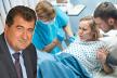 0805stock-photo-in-the-hospital-woman-in-labor-gives-birth-obstetricians-and-doctors-assist-her-husband-supports-1181843923.jpg
