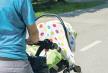 stockphotocloseupofmotherhandspushingbabystroller651787183.jpg