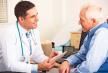 stockphotoamericandoctortalkingtoseniormaninsurgery98521079.jpg