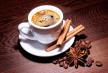 stockphotocoffeeincupwithmilkcinnamonandanisestarsonwoodensurface315614276.jpg