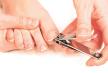 stockphotophotographycloseupofawomancuttingtoenails176393867.jpg