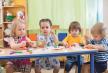 stockphotokidsgroupmakingartsandcraftsinkindergartenordaycarecenter722446633.jpg