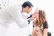 stockphotooptometryconceptprettyyoungwomanhavinghereyesexaminedbyaneyedoctor283020266.jpg