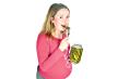 stockphotohappypregnantwomantastingpickleisolatedonwhite13319209.jpg