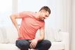 stockphotounhappymansufferingfrombackacheathome370613435.jpg