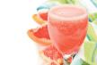 stockphotofreshgrapefruitjuiceonawhitebackground143797468.jpg