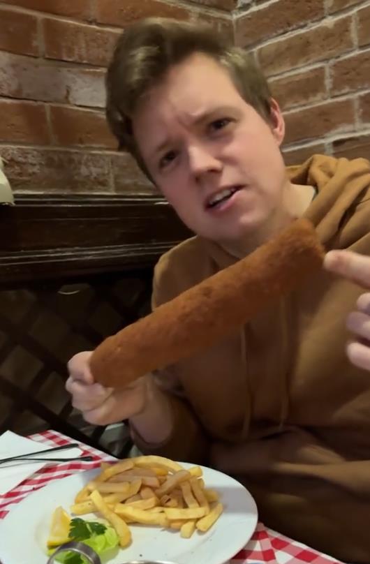 Amerikanac jede hranu iz Zabele (9).png