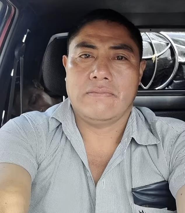 96549385-14534787-Miguel_Sut_was_assisting_Christian_church_members_baptize_a_fell-a-3_1742918227063 copy.jpg