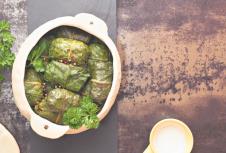 stockphotostuffedcollardgreenscollardgreensrollsincrockpotwithspicesmacroselectivefocus394234576.jpg