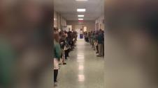 v_a-little-boy-who-beat-cancer-gets-a-warm-welcome-from-his-entire-school111111_15813405395.jpg