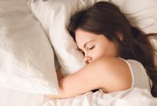 stockphototiredyoungwomansleepswellinsoftbedwithwhitesheetsfemaleteenpeacefullyrestingwith653167057.jpg