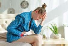 stockphotosadunhappywomansufferingfrompmsandmenstruationpainhavingstomachacheabdominalpain1357975862-1350-900.jpg