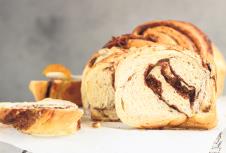 stockphotoslicesofhomemadecinnamonbabkaorswirlbriochebreadcinnamonrollbreadpovitica1624680559.jpg