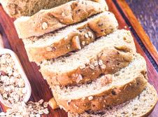 stockphotoveganbreadwithoutanimalproductsmadefrombraziliannutsoatsandflaxseedconceptof1673236747.jpg