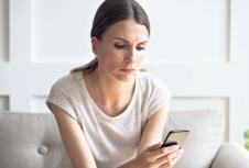 stockphotoheadshotunhappythoughtfulwomanlookingatcellphonescreenwaitingforcallfromboyfriend1569052078.jpg