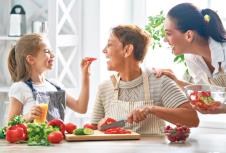 stockphotohealthyfoodathomehappyfamilyinthekitchengrandmamotherandchilddaughterarepreparing1175782636.jpg