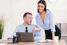 stockphotosexualharassmentconceptlustfulbusinessmanlookingatsecretarygirlsbreastsittingat1720385353.jpg