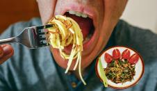 0612-stockphotocloseupofmaneatingspaghettiwithcrispyworms1284793414.jpg