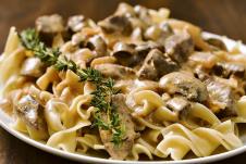 stockphotoselectivefocuswasusedonthiscloseupimageofcreamybeefstroganoffmadewitheggnoodles378469069.jpg