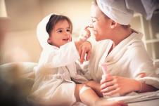 stockphotoplayfulwithmommyafterbathlittlegirl1015558300.jpg