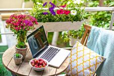 stockphotobeautifulterraceorbalconywithsmalltablechairandflowerstonedimage282159782.jpg