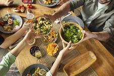 close-up-friends-with-delicious-salad.jpg