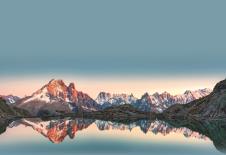 stock-photo-panorama-french-alps-landscape-of-lac-blanc-with-mont-blanc-mountain-range-reflected-on-lake-in-the-2394035833 copy.jpg