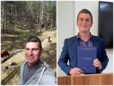 Luka Crepuljarević na livadi s kravama i fakultetskom diplomom u rukama